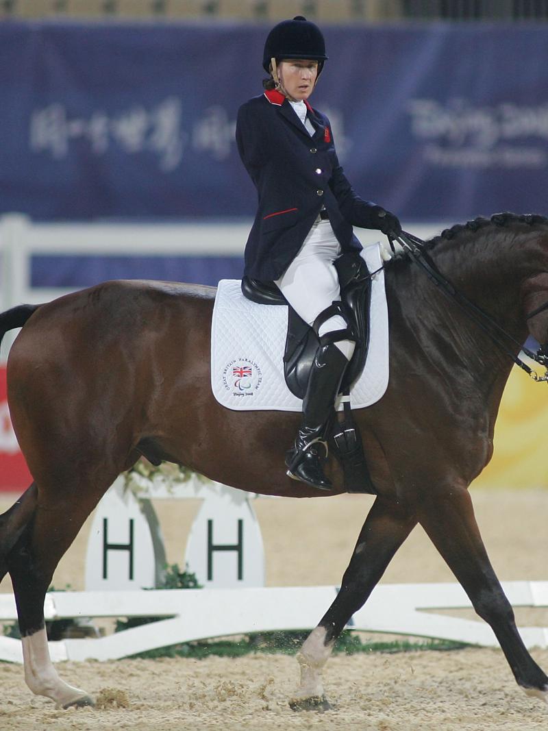A picture of a woman riding