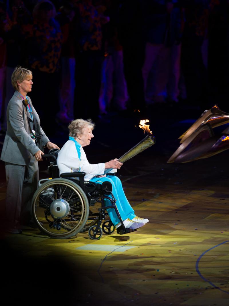 Margaret Maughan lights the Cauldron