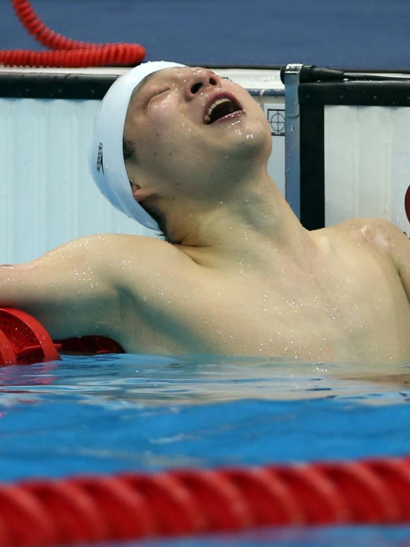 China's Qing Xu celebrates London 2012 gold