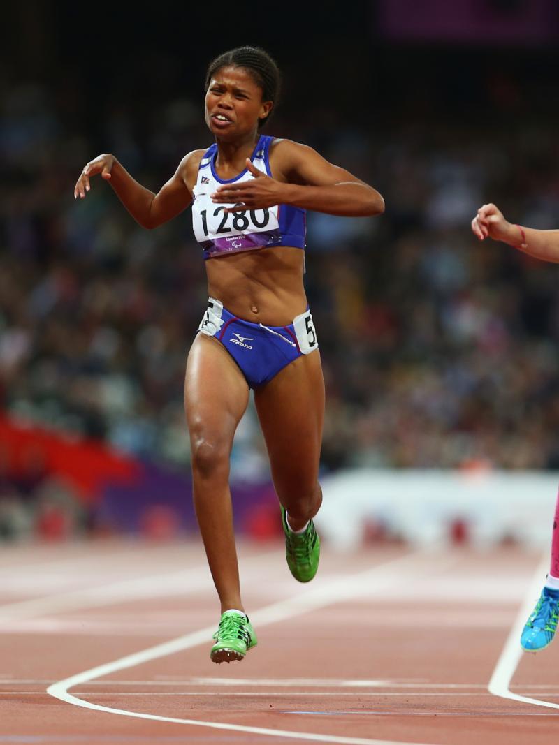 A picture of three women running during an athletics event
