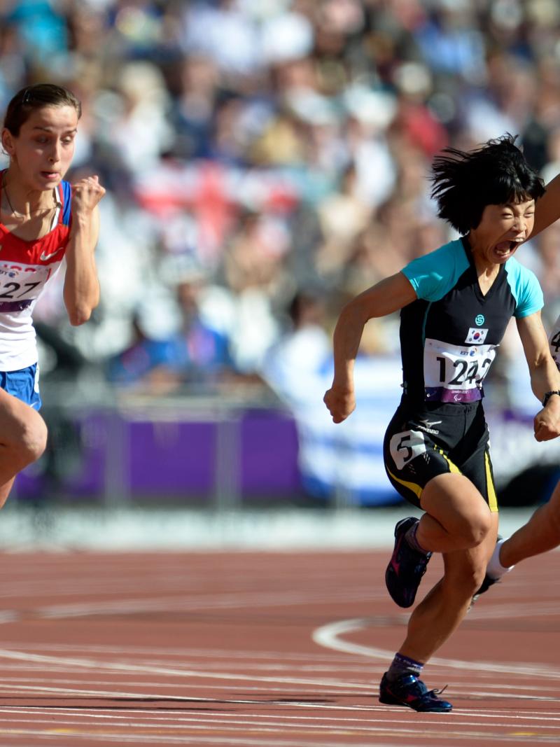 A picture of 3 women running in an athletics race