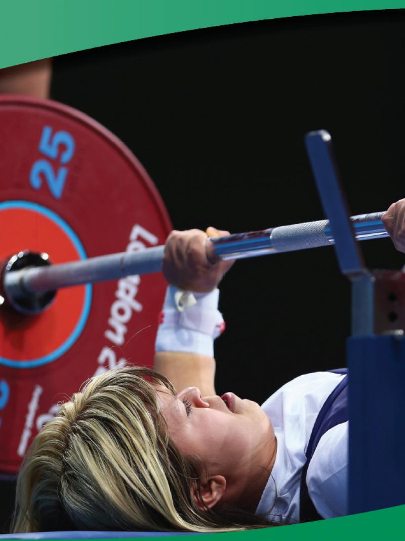 A picture of a woman competing in a powerlifitng competiton