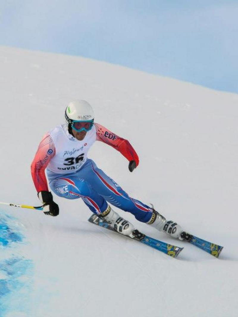 France's Vincent Gauthier-Manuel skiing slalom race at 2013 IPC Alpine Skiing World Cup in St Moritz, Switzerland