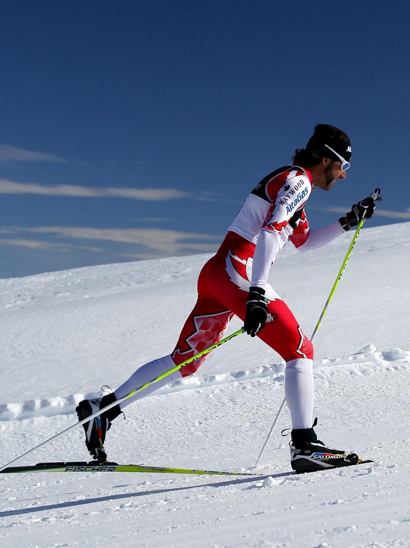 A picture of a man skiing a biathlon