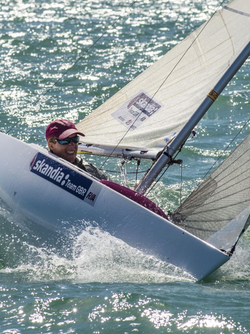 A picture of a woman in a small boat