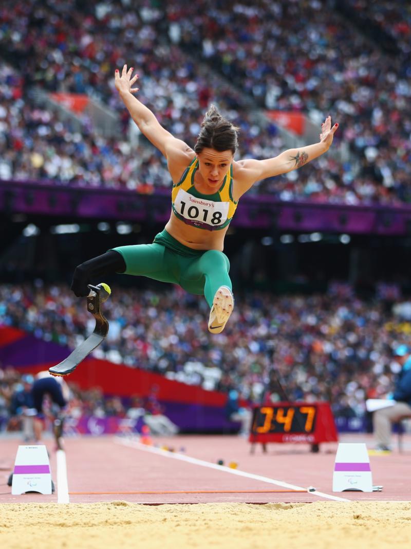 A picture of a woman with her body above the floor
