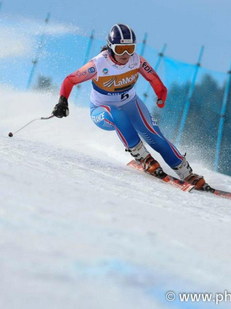A picture of a woman skiing
