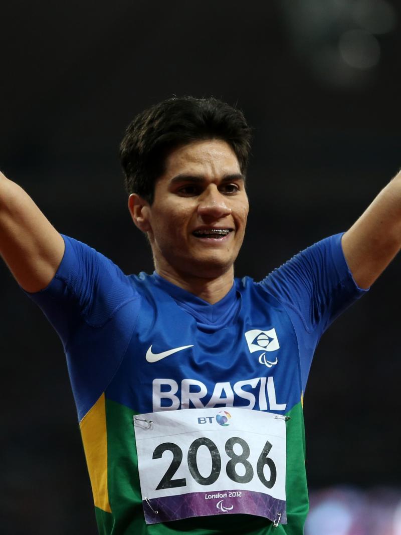 A picture of a man with his hands up