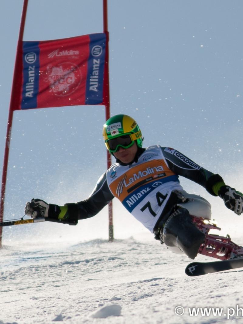 A picture of a man skiing on the slopes