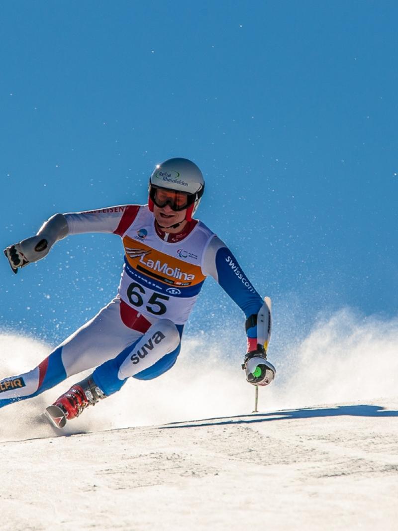A picture of a man skiing on the slopes