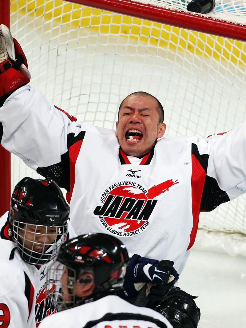 A picture of a man celebrating his victory