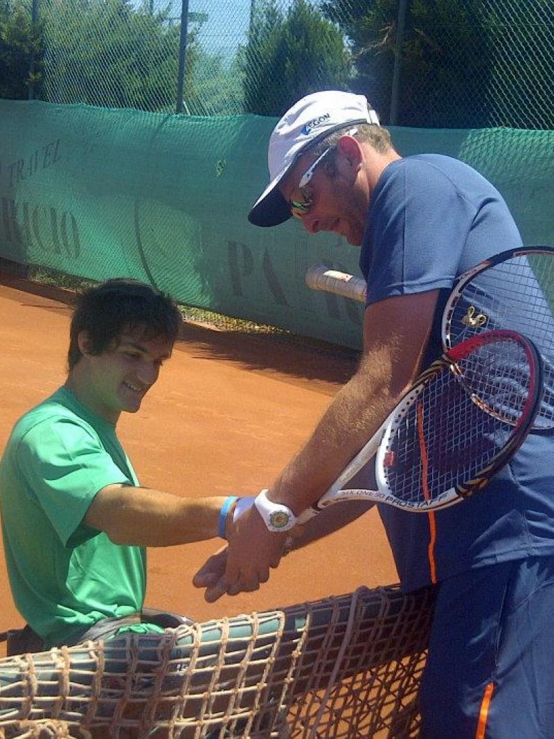 Gustavo Fernandez works with coaches at a ITF  workshop in Turkey