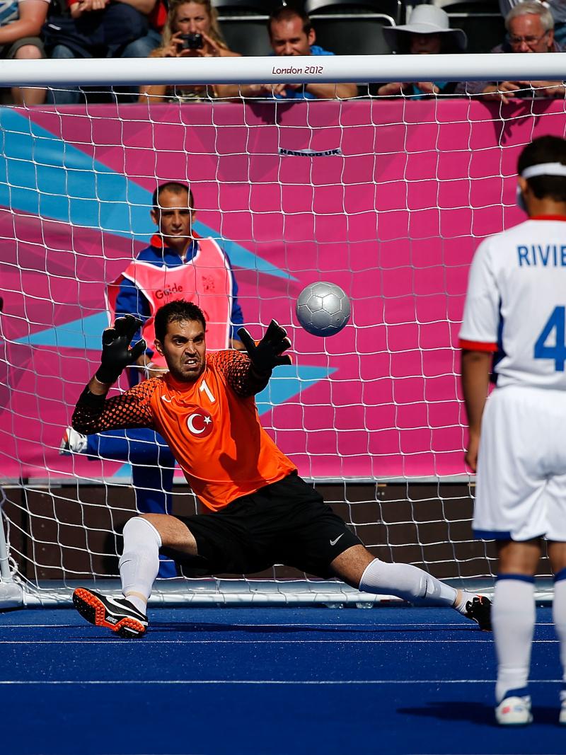 David Labarre of France scores a penalty against Ali Hidir Kurt of Turkey - Football 5-a-side
