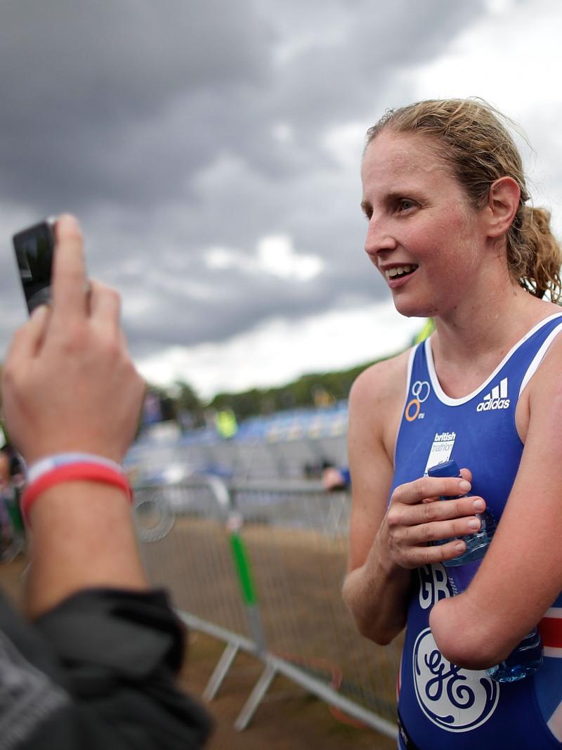Para-triathlete Clare Cunningham of Great Britain talks to a journalist