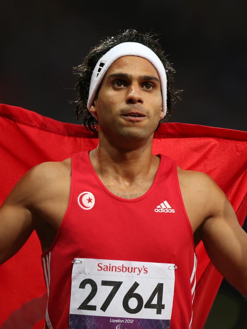 Mohamed Farhat Chida of Tunisia wins gold in the Men's 400m - T38 Final at the London 2012 Paralympic Games 