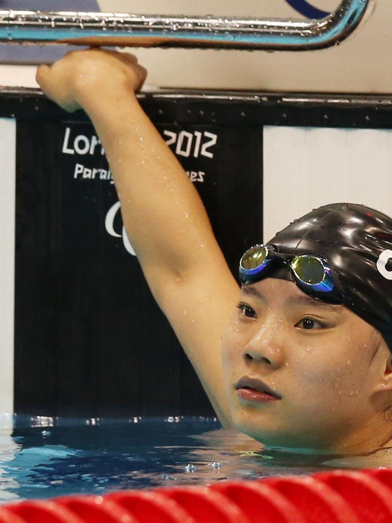 Jiangbo Xia wins gold at London 2012