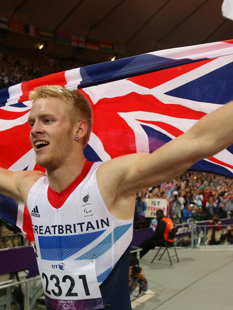 Jonnie Peacock celebrates winning gold in the men's 100m T44 Final on Day 8 of the London 2012 Paralympic Games.