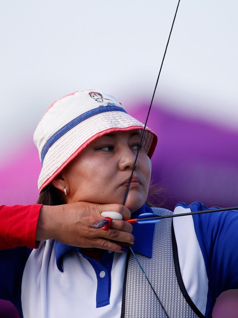 Javzmaa Byambasuren of Mongolia competes in the Women's Individual Recurve - Standing class at London 2012
