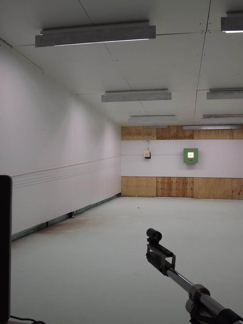 Jason Maroney built his own rifle range with a world class electronic target machine in his shed