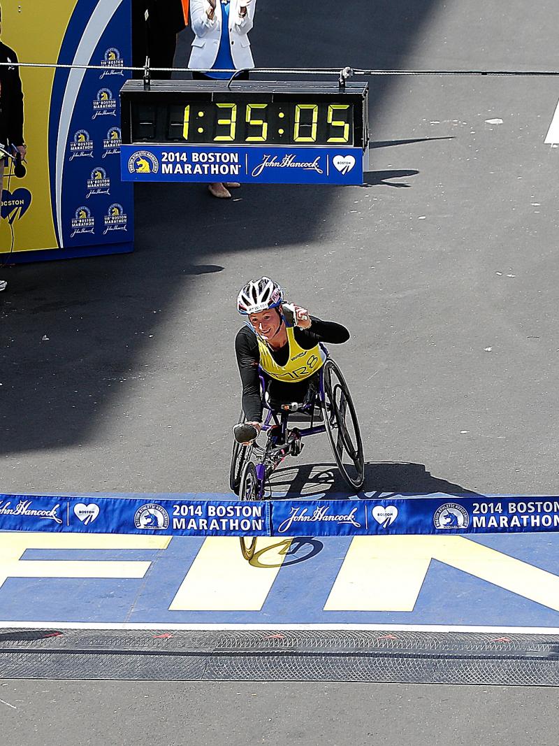 Tatyana McFadden, a wheelchair racer, crosses the Boston Marathon finish line