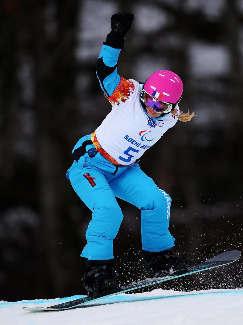 Cecile Hernandez-Cervellon snowboards down the course at Sochi 2014.