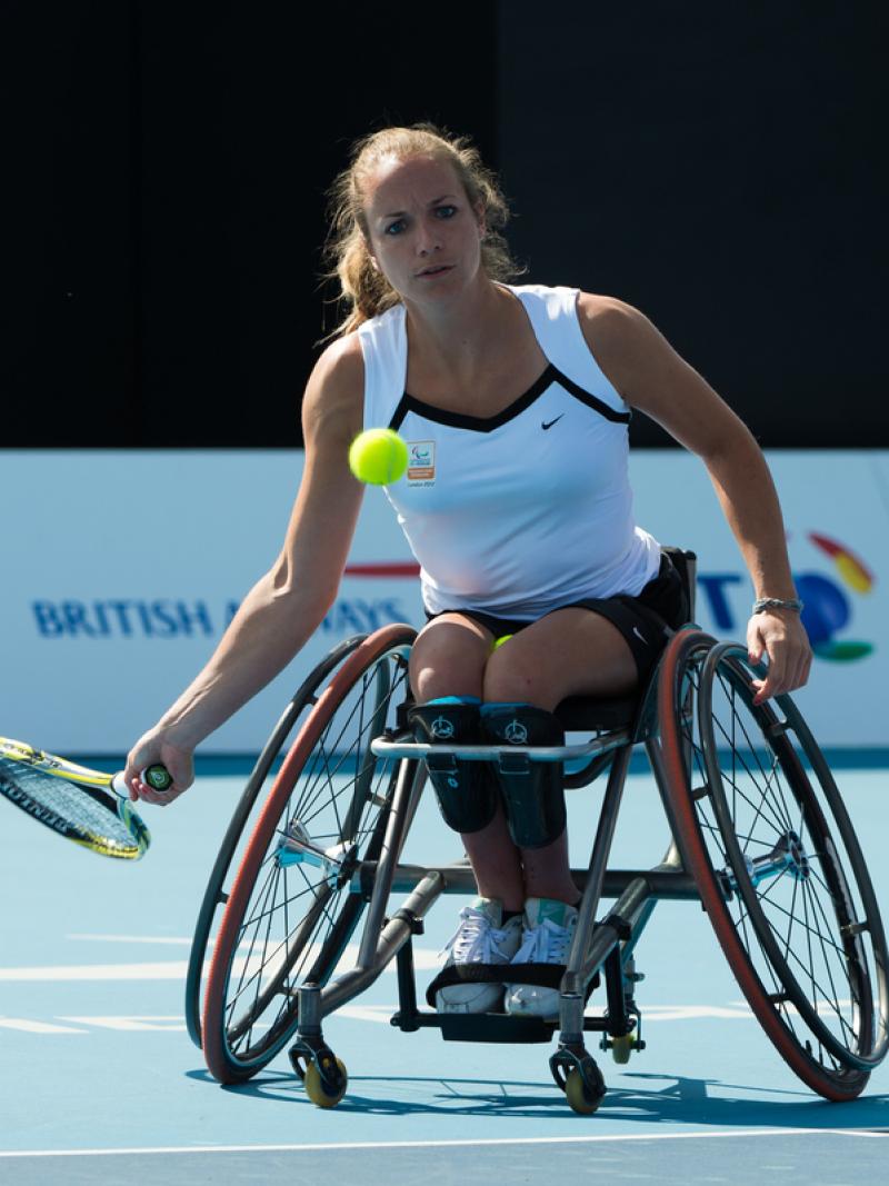 Athlete in a competition of wheelchair tennis.