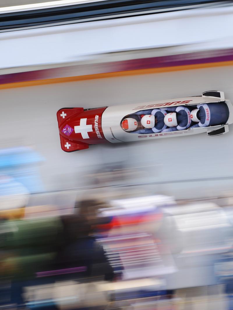 A bobsleigh goes so fast down the track it's a blur.