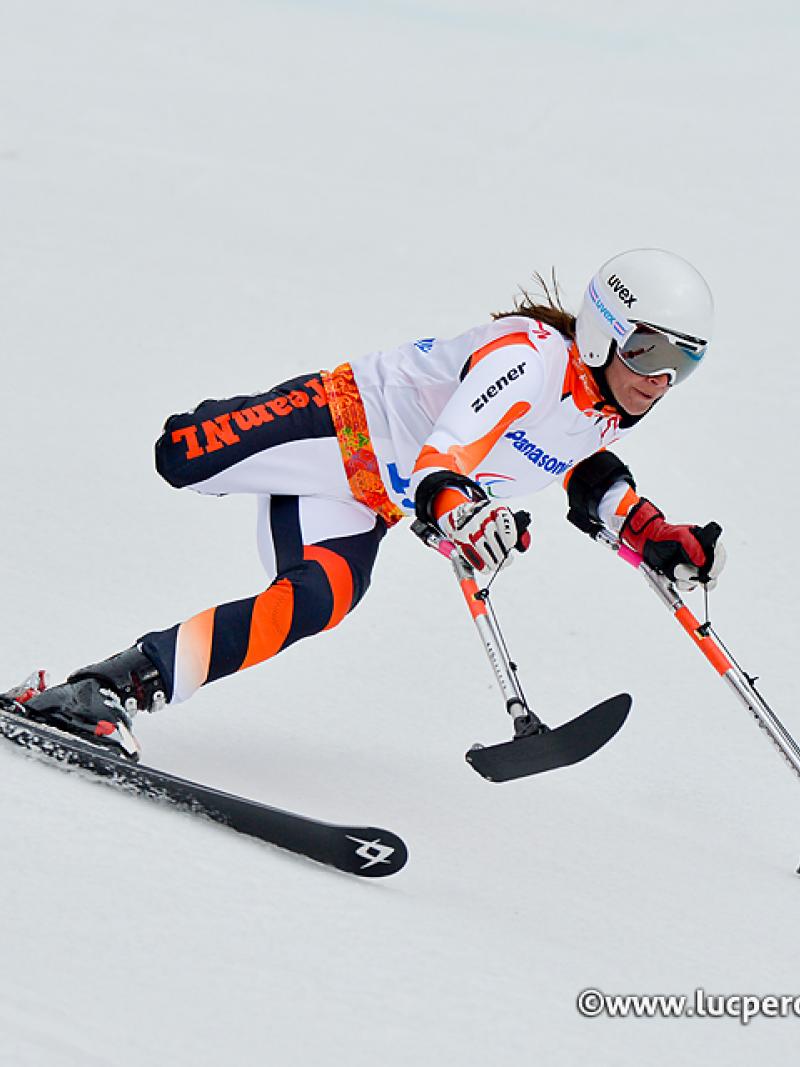 One-legged skier going down the slope.