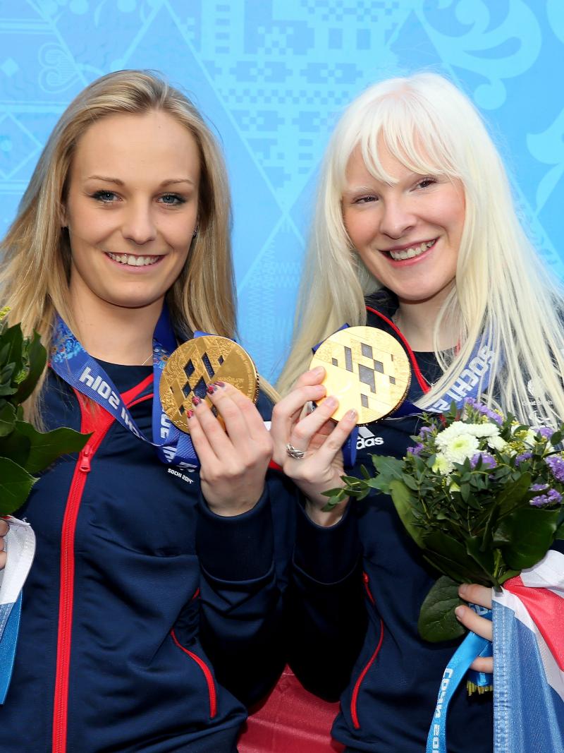 Great Britain's Kelly Gallagher (right) and guide Charlotte Evans (left) celebrate winning Sochi 2014 gold in the women's Super-G