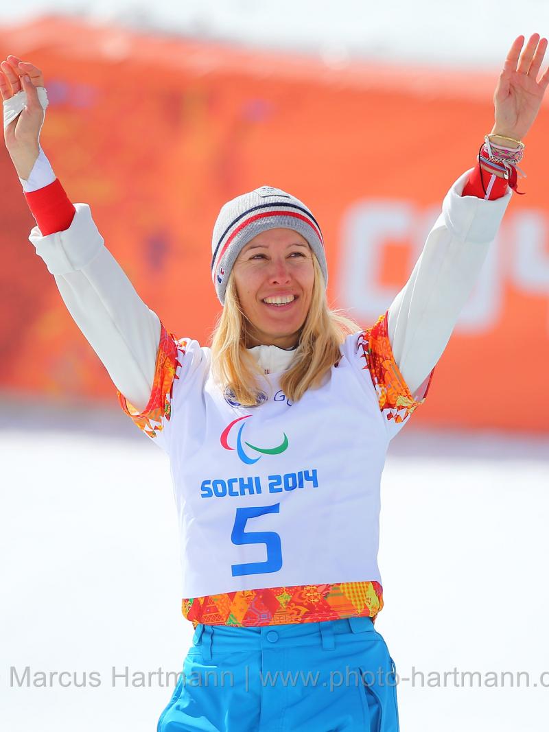 Upper body of woman celebrating