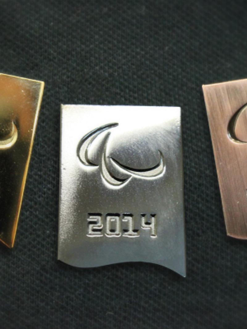 Paralympic pins in the colours gold, silver and bronze