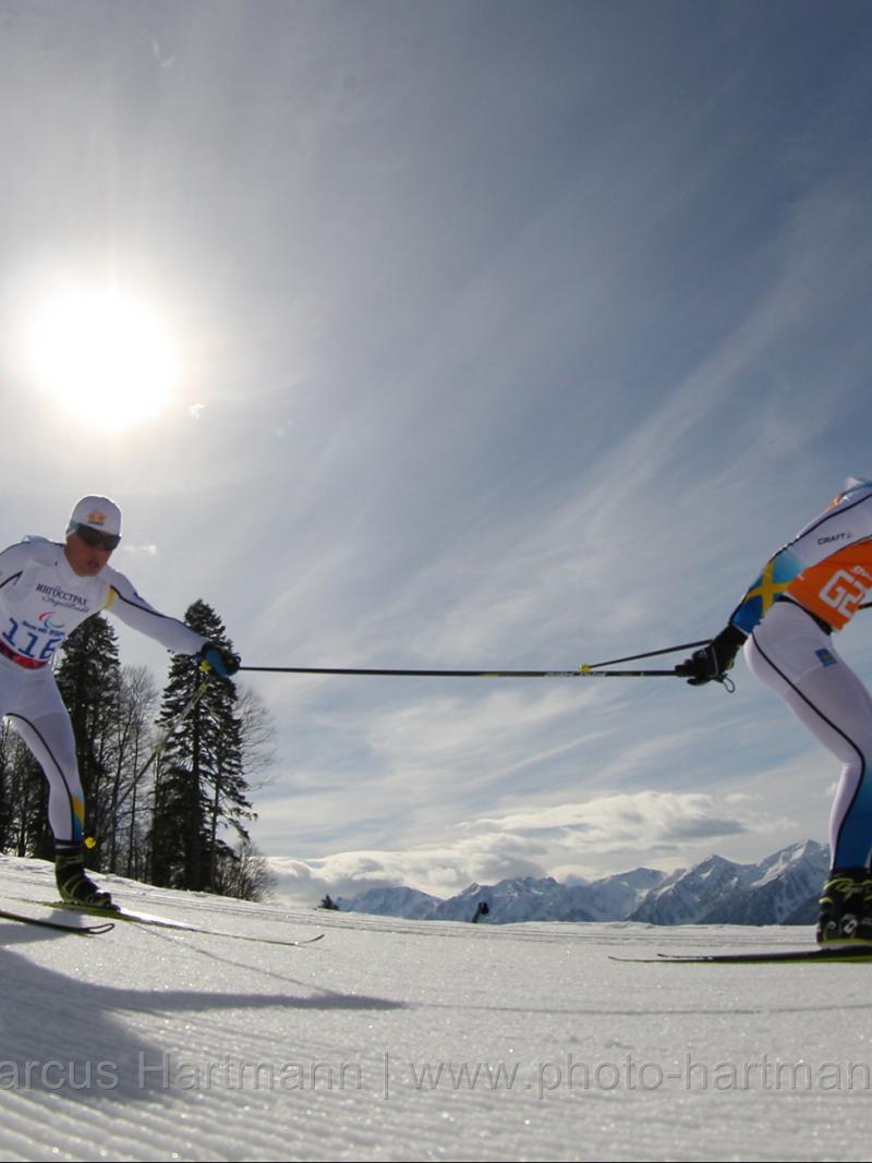 Zebastian Modin, Sweeden holds on to his guides pole as he goes downhill