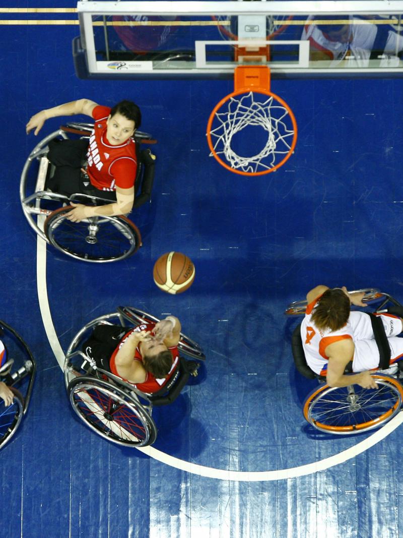 Tracey Ferguson #12 of Team Canada puts up a two pointer in Semi Final action against Team Netherlands at the 2014 Women's World Wheelchair Basketball Championships in Toronto, Canada.