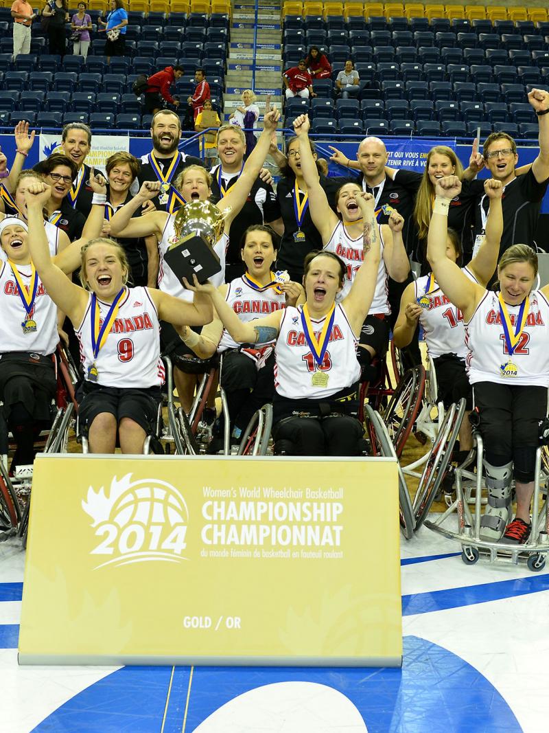 Team Canada celebrates their victory over Team Germany in the gold medal game at the 2014 Women's World Wheelchair Basketball Championships in Toronto, Canada.