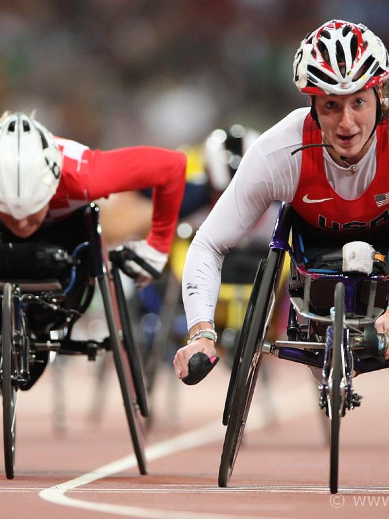 Wheelchair racers on the track of a stadium