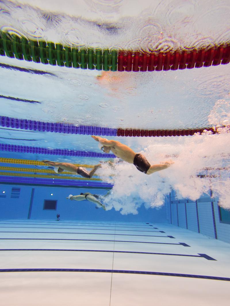 Under water shot of men's race, diving
