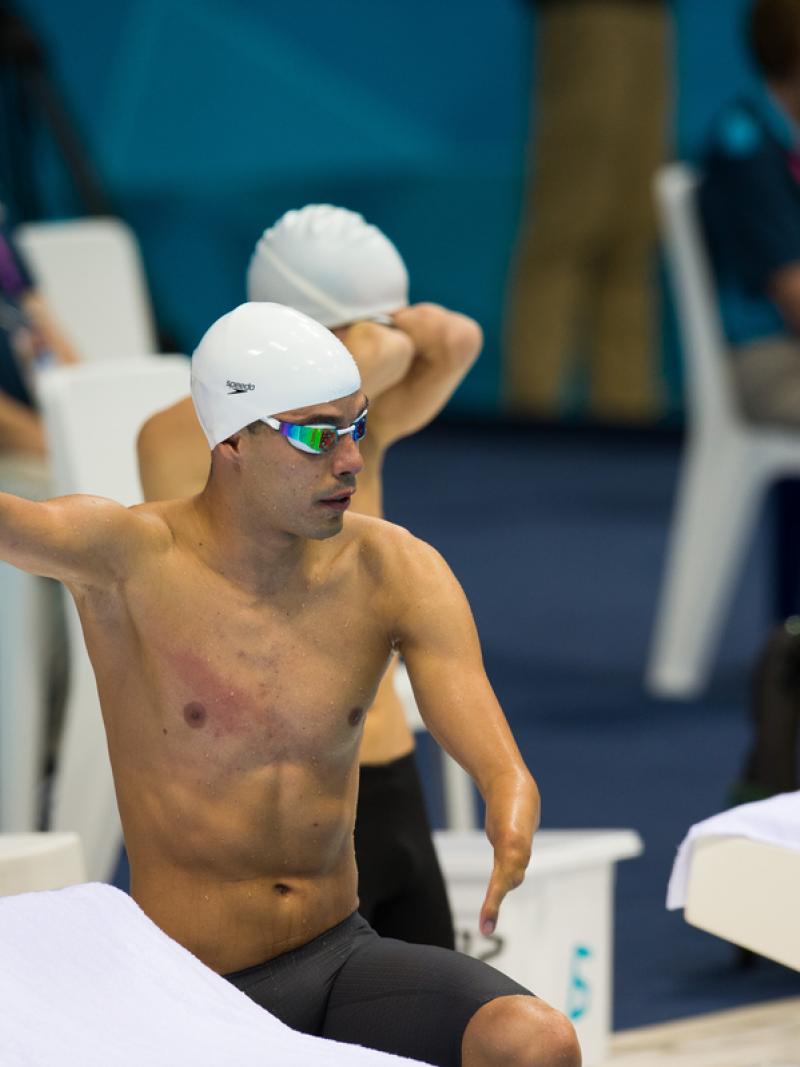 Man with swim cap prepares for the start