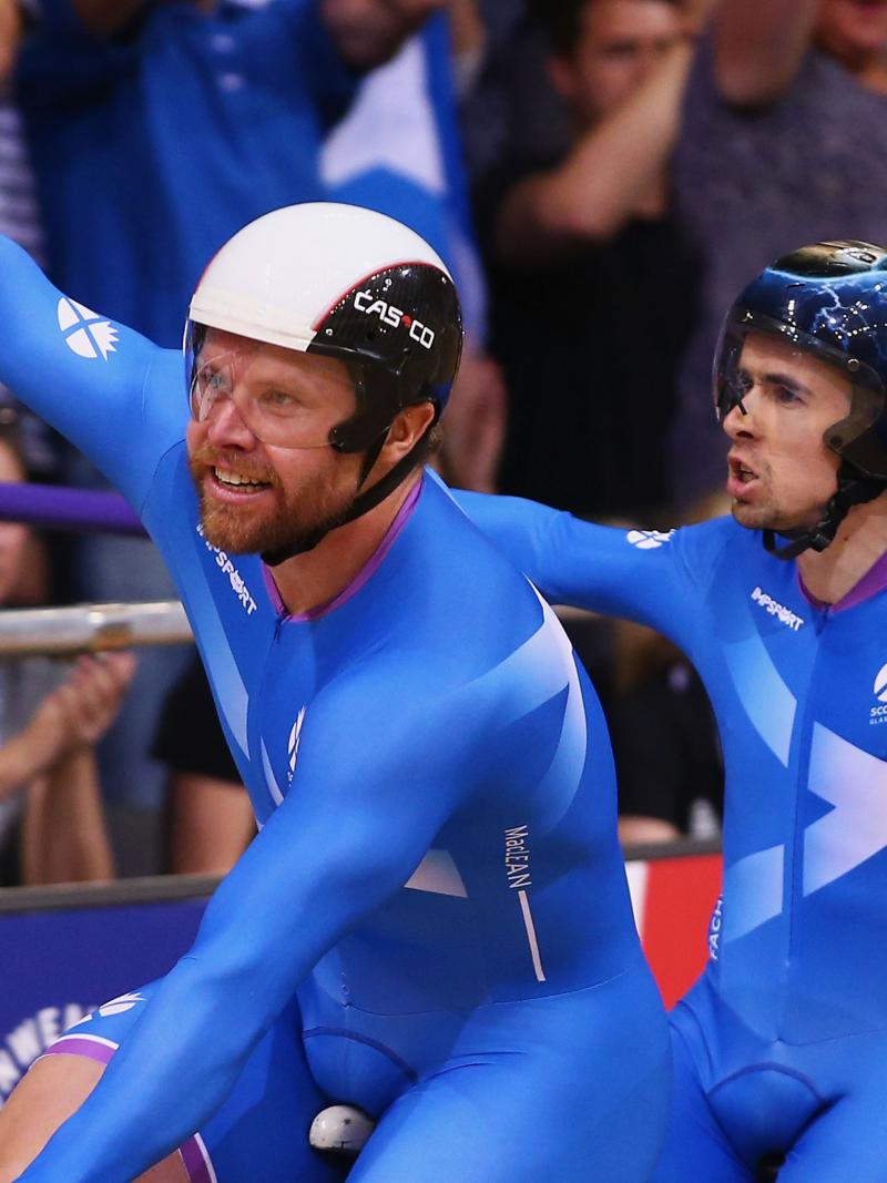 Scotland's Neil Fachie and co-pilot Craig MacLean celebrate their para-cycling victory at the Glasgow 2014 Commonwealth Games.