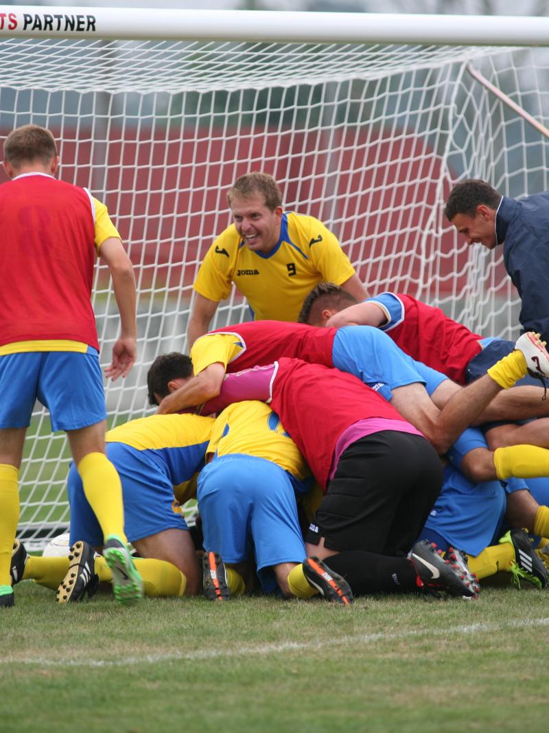 Ukraine celebrate victory at the 2014 CPISRA European Championships in Maia, Portugal.