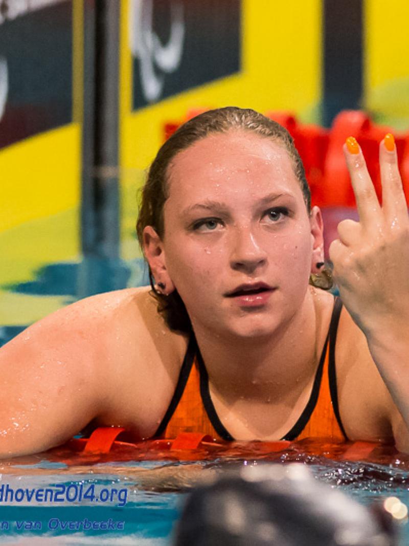 A Dutch swimmer after winning a medal at the 2014 IPC Swimming European Championships.