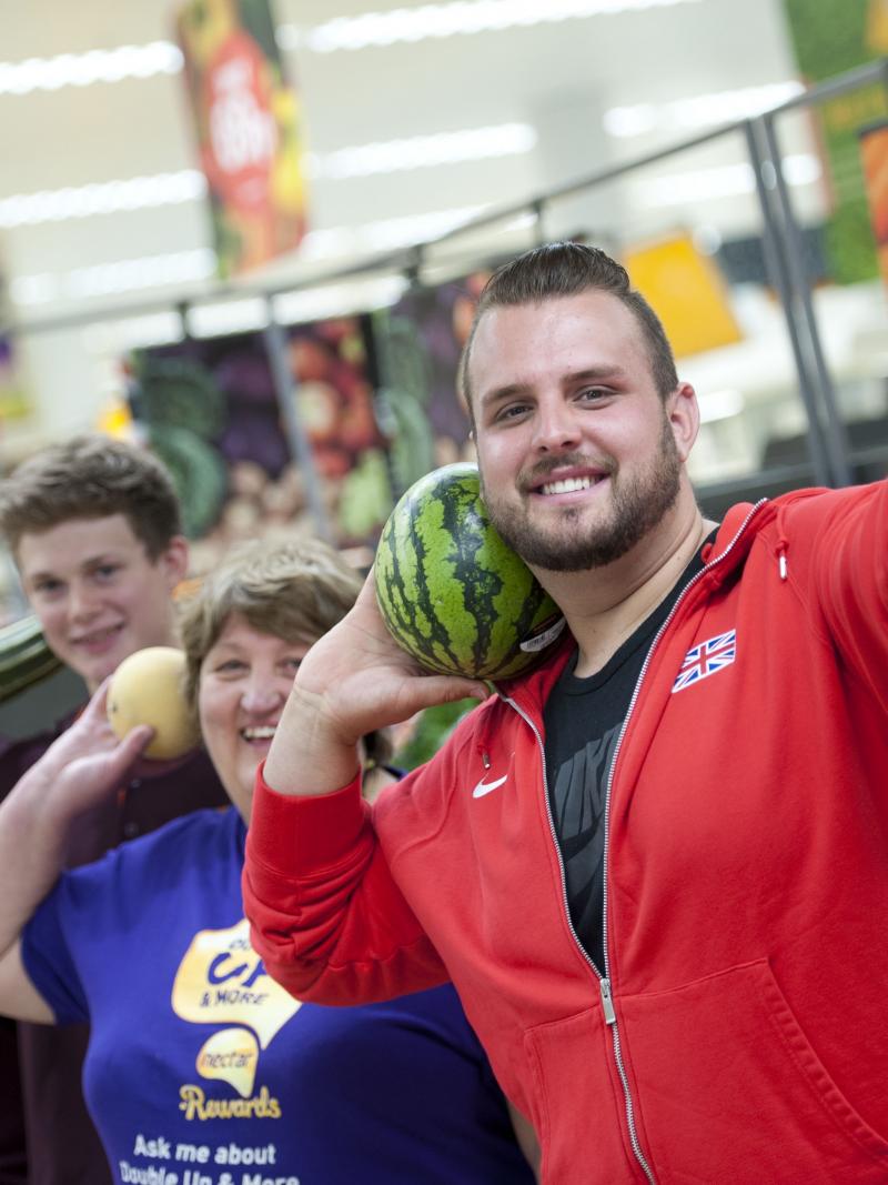 Aled Sion Davies, Nathan Stephens and Kryon Duke at local supermarket in Swansea