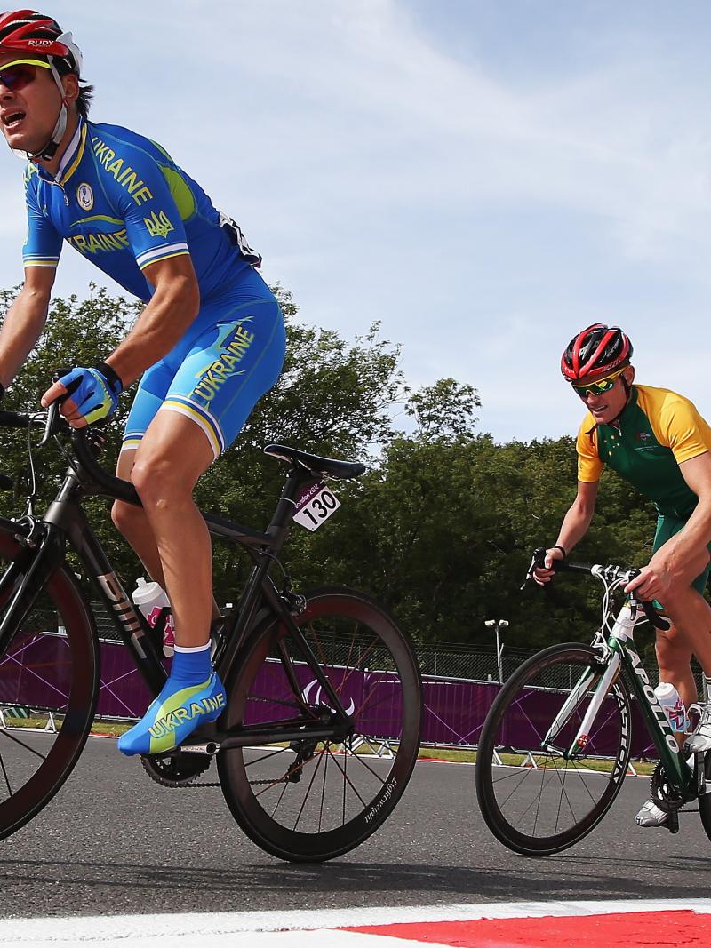 Australian cyclist behind Italian cyclist