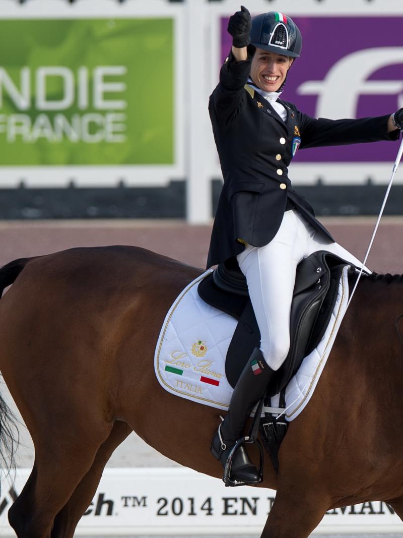 Italian woman celebrates on a horse