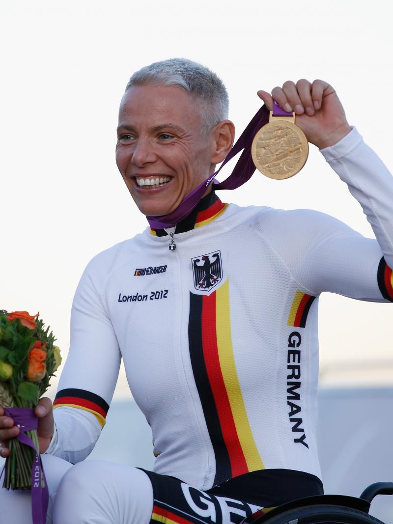 Germany's Andrea Eskau recevies her gold medal after winning the women's H4 road race at the London 2012 Paralympic Games at Brands Hatch.