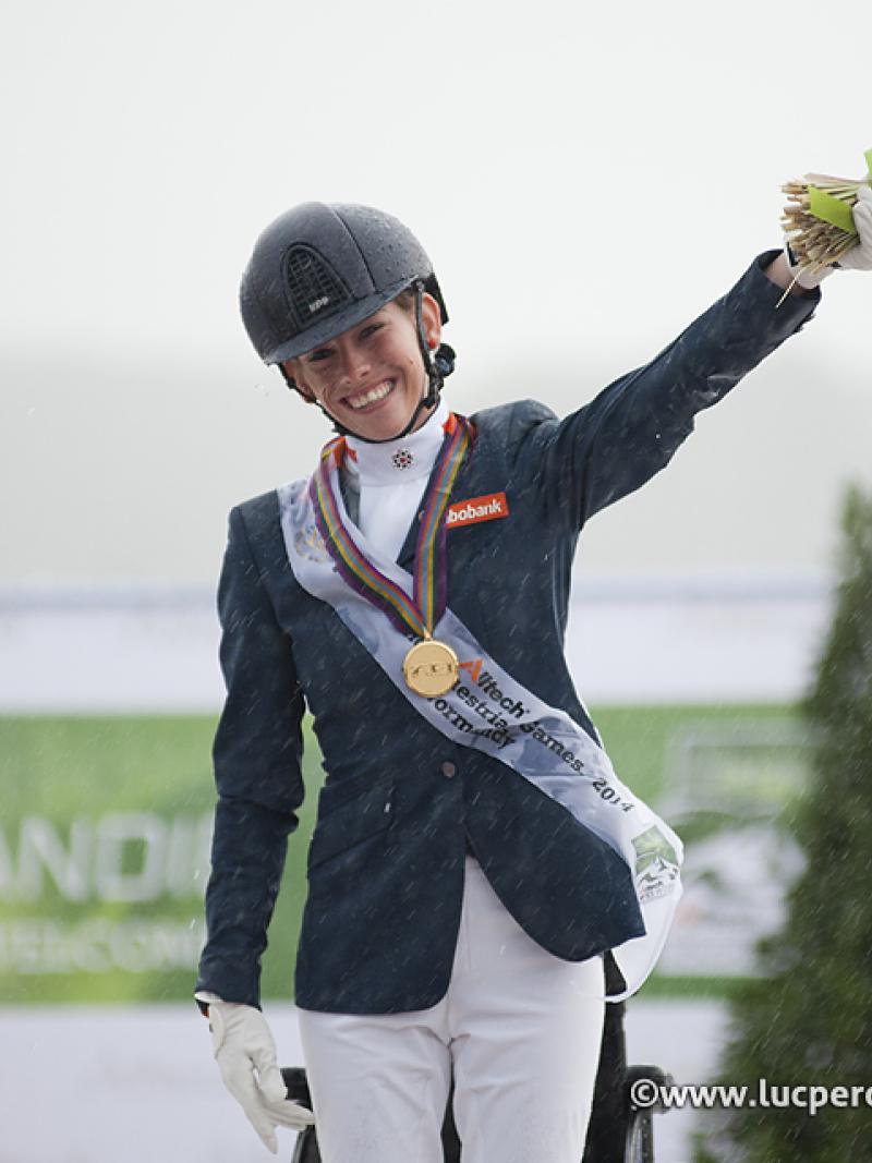 A delighted Rixt van der Horst of Denmark celebrates winning gold at the Alltech FEI World Equestrian Games.