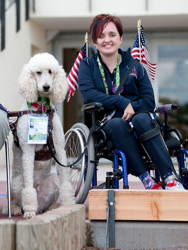 US para-equestrian rider Sydney Collier with service dog Journey.