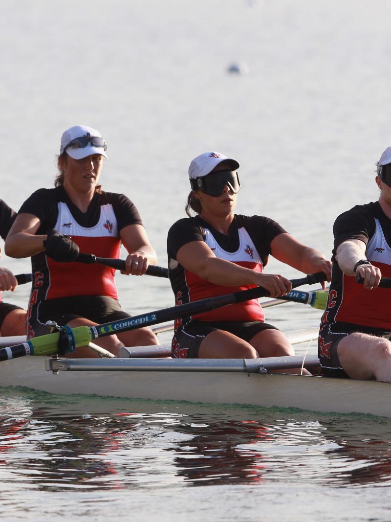 Four rowers in a boat