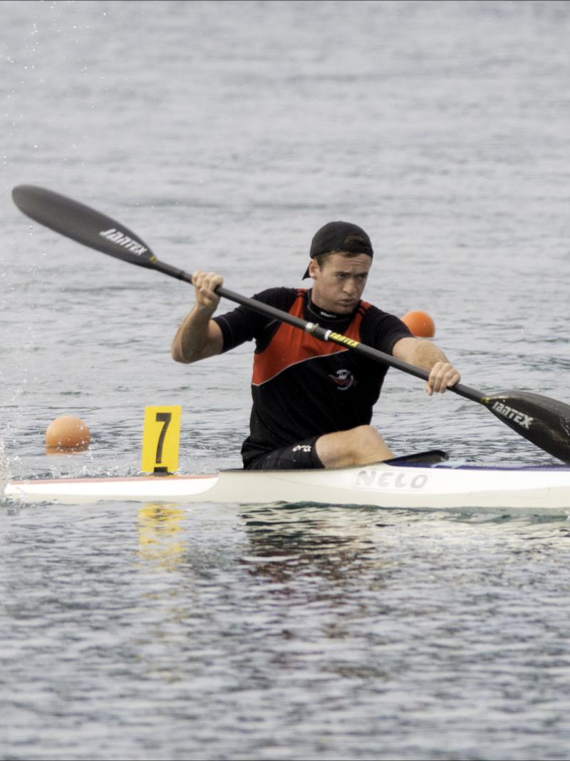 Man in canoe in action on the water
