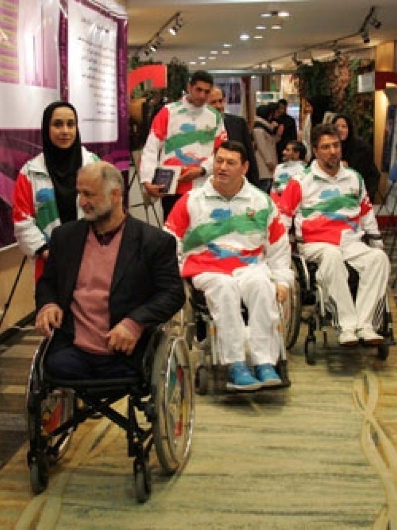 Members of the Iranian Parliament visit the NPC Iran exhibition in December 2014.