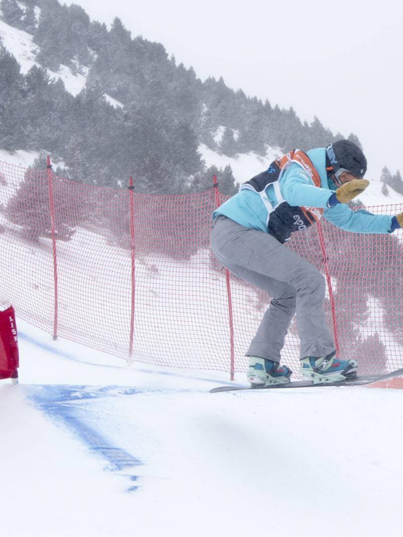 Women on snowboard on the slope